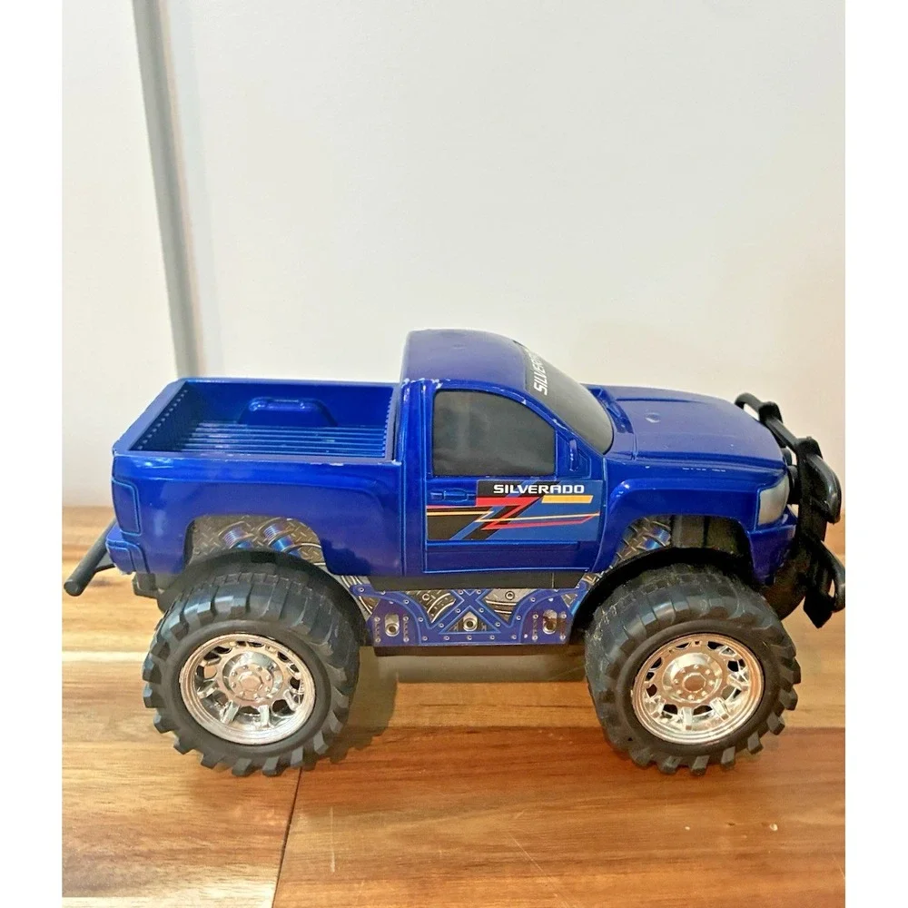 Chevrolet Silverado Blue Monster Truck 4x4 Toy Pickup Brush Guard Chrome Wheels
